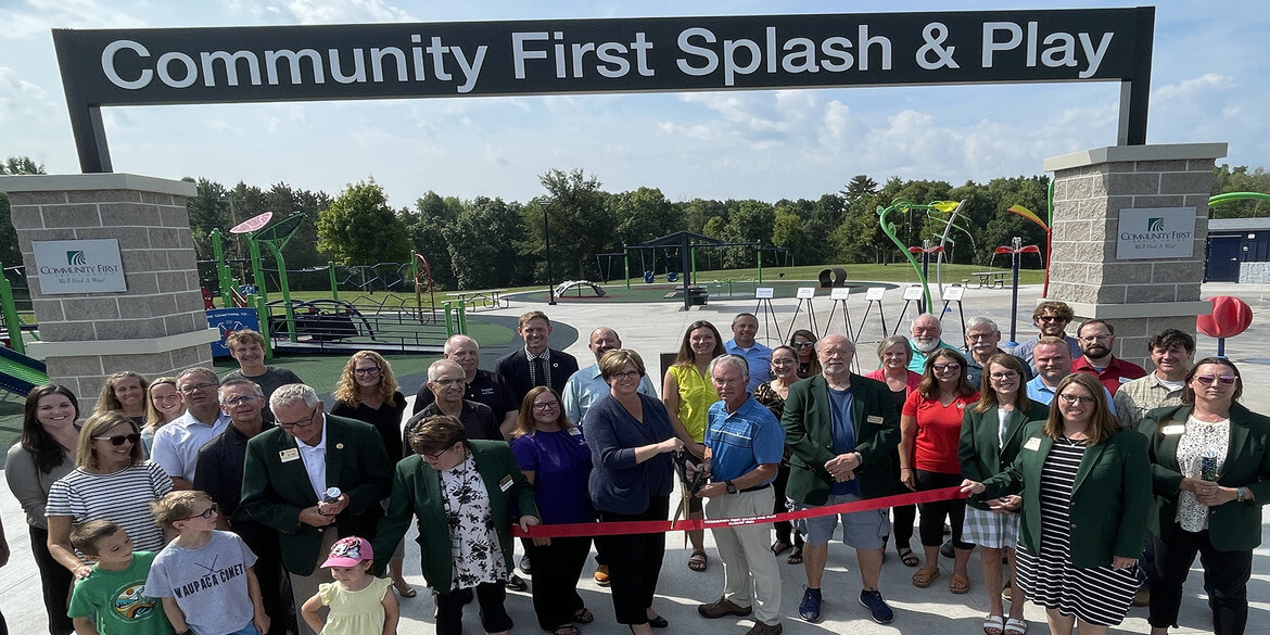 Waupaca Splash and Play ribbon cutting group photo.