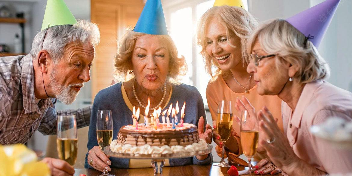 Elderly people celebrating birthday.