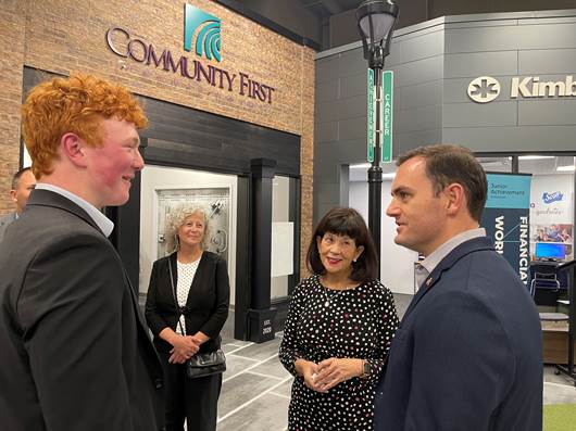 Cathie Tierney (CFCU President/CEO), Deb Lowe (CFCU retiree/volunteer), and Congressman Mike Gallagher (R-WI)
speaking with a student about the financial literacy bill.