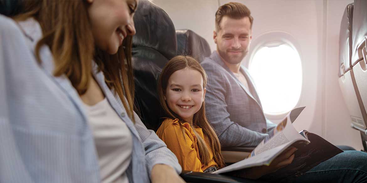Family of three on airplane