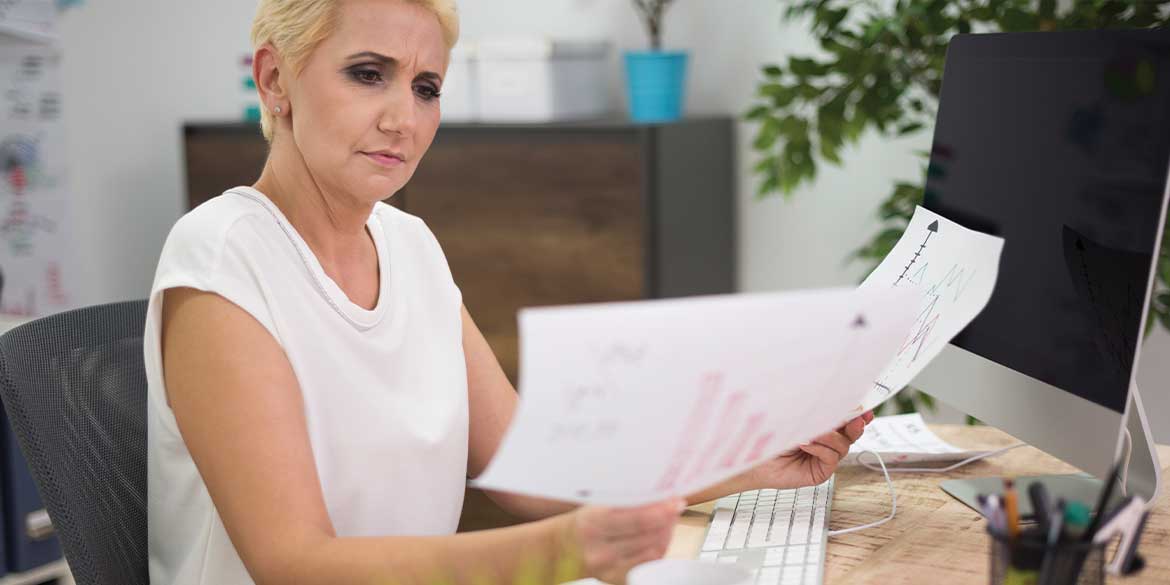 Women looking at tax documents