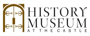 History Museum at the Castle logo in with brown doors and black text.