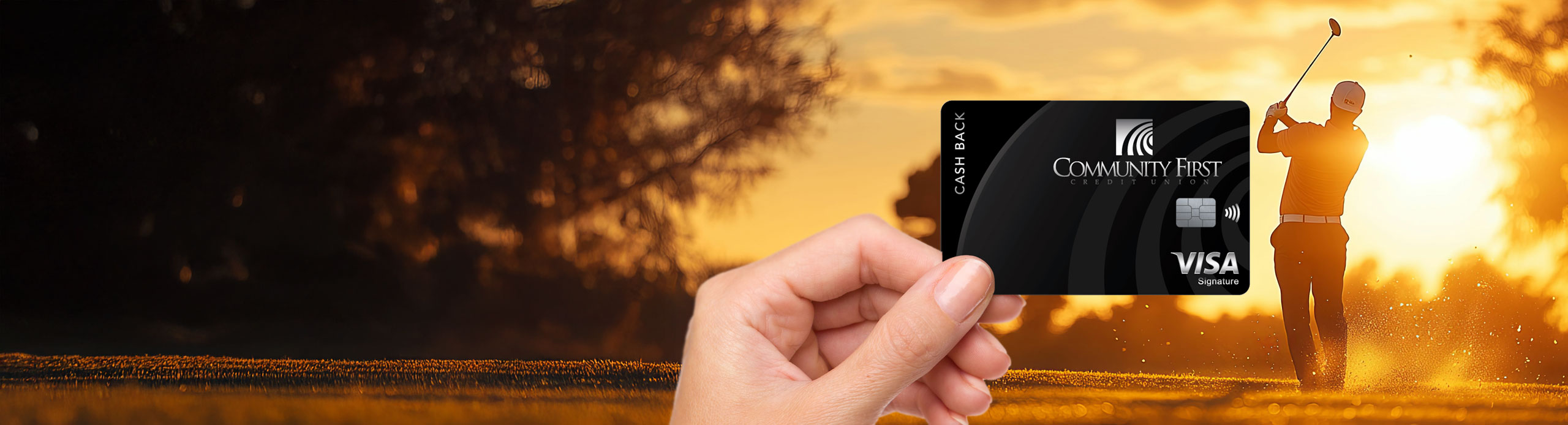 Holding Visa Signature card gold course in background