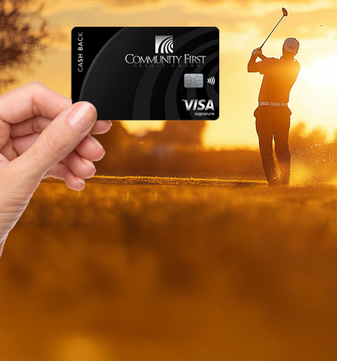 Holding Visa Signature card gold course in background
