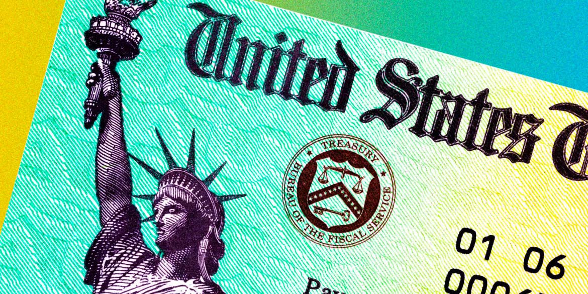 A close-up of part of lady liberty with a treasury emblem.