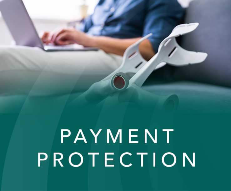 Man with laptop and crutches, green background and white text that states Payment Protection.