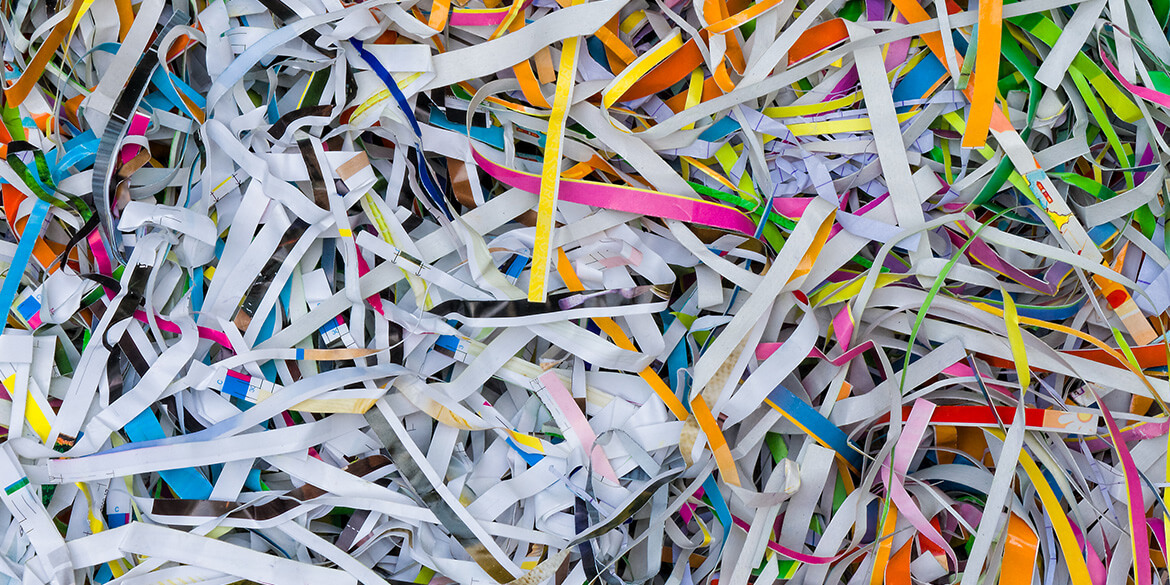 Multicolored shredded financial statements.