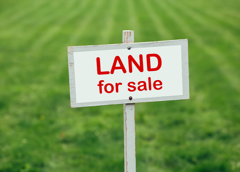 land for sale sign.