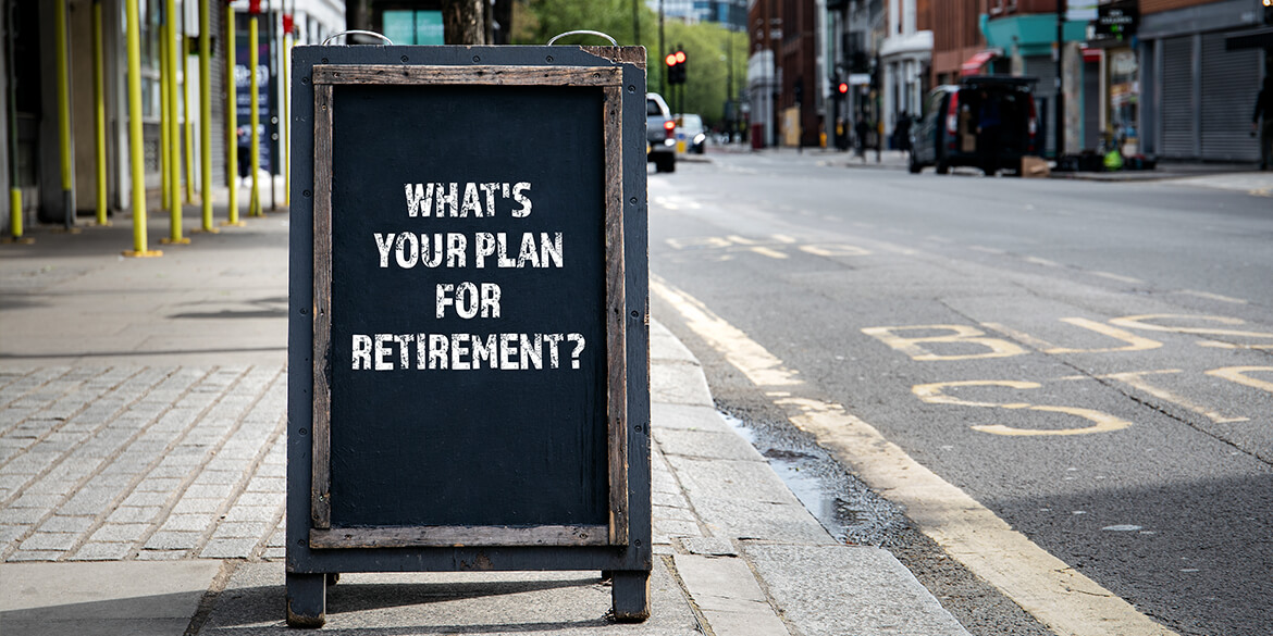 Sandwich board on sidewalk stating what's your plan for retirement?