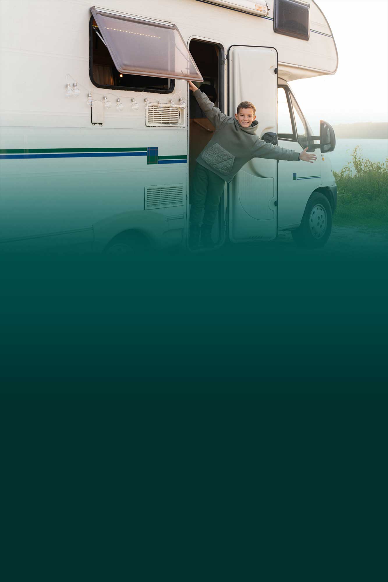 Kid standing on the steps of a camper smiling with an anytime loan from Community First Credit Union
