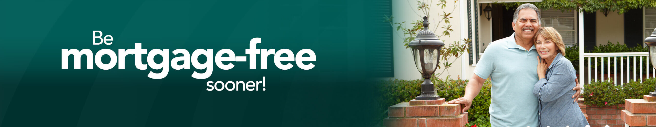 couple in front of house.