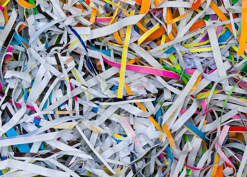 Multicolored shredded financial statements.
