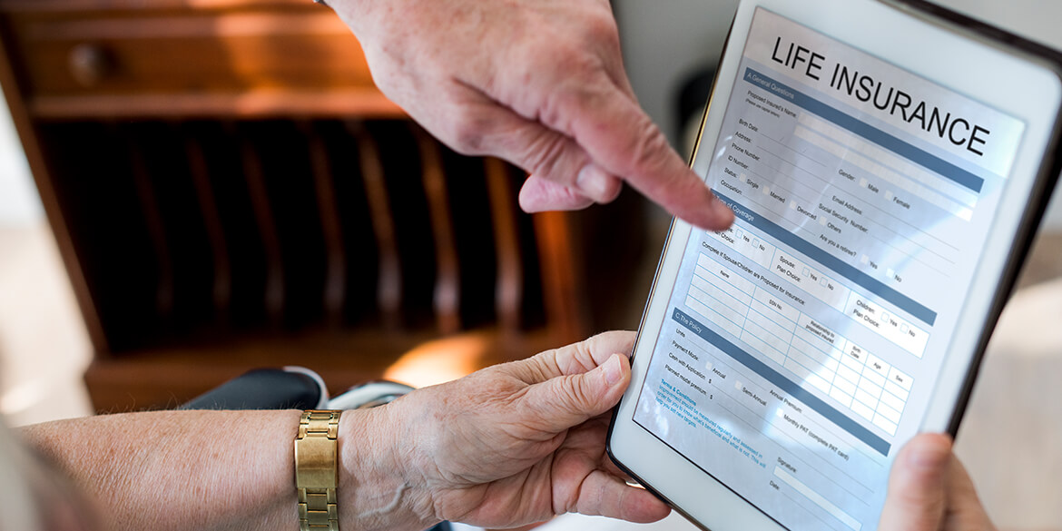 Life insurance information displayed on tablet.