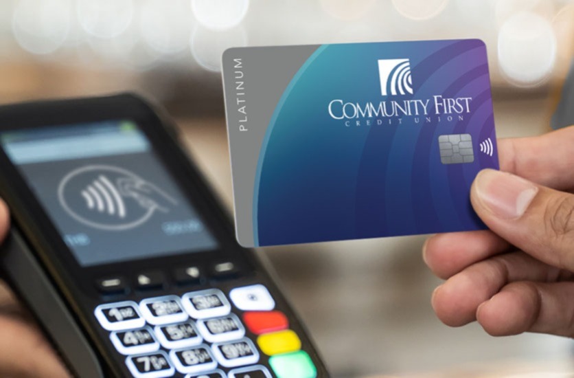 holding a CFCU credit card.